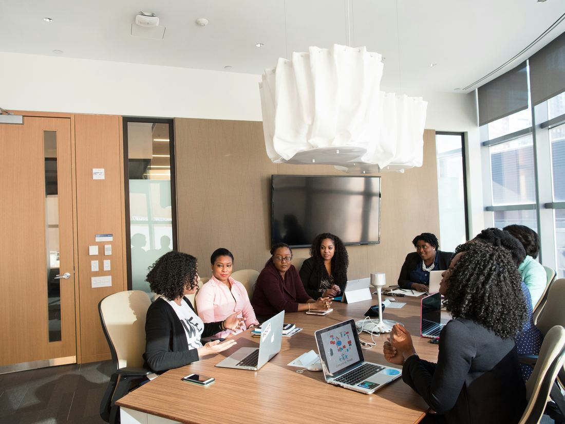 A team reviewing progress together in a meeting room
